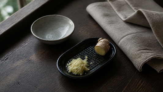 Banko ware ceramic ginger grater in use with fresh ginger in a Japanese kitchen