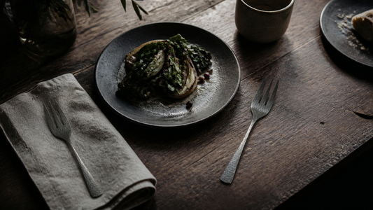 Japanese hammered stainless steel forks on a quiet dinner table