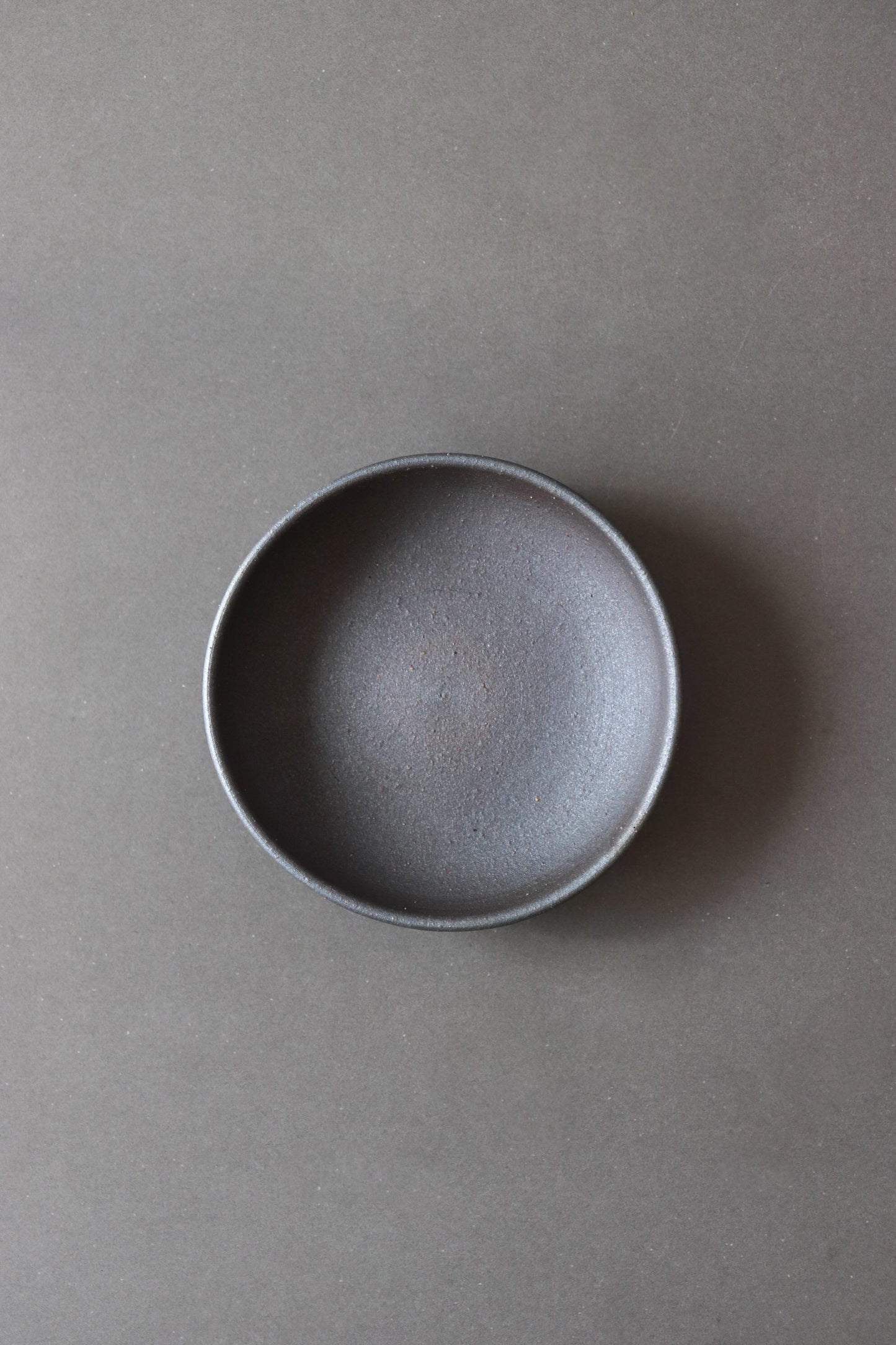 Japanese Black Footed Bowl | Charcoal Stoneware Serving Bowl | Made in Japan Ceramic Dish | Wabi Sabi Tableware | Small Raised Bowl
