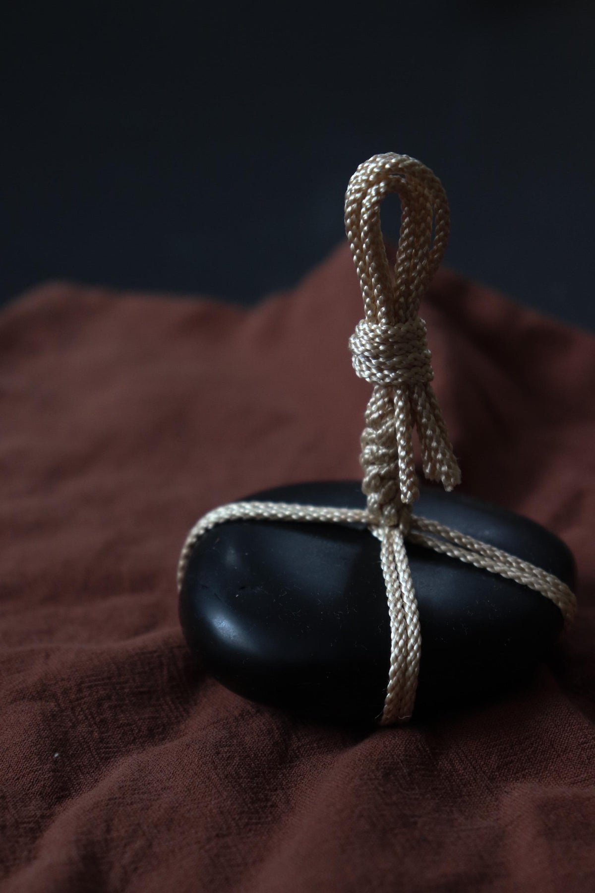 Japanese Sekimori-ishi Barrier Stone, Polished Nachiguro Stone with Edo-Style Braided Cord, Wabi Sabi Object