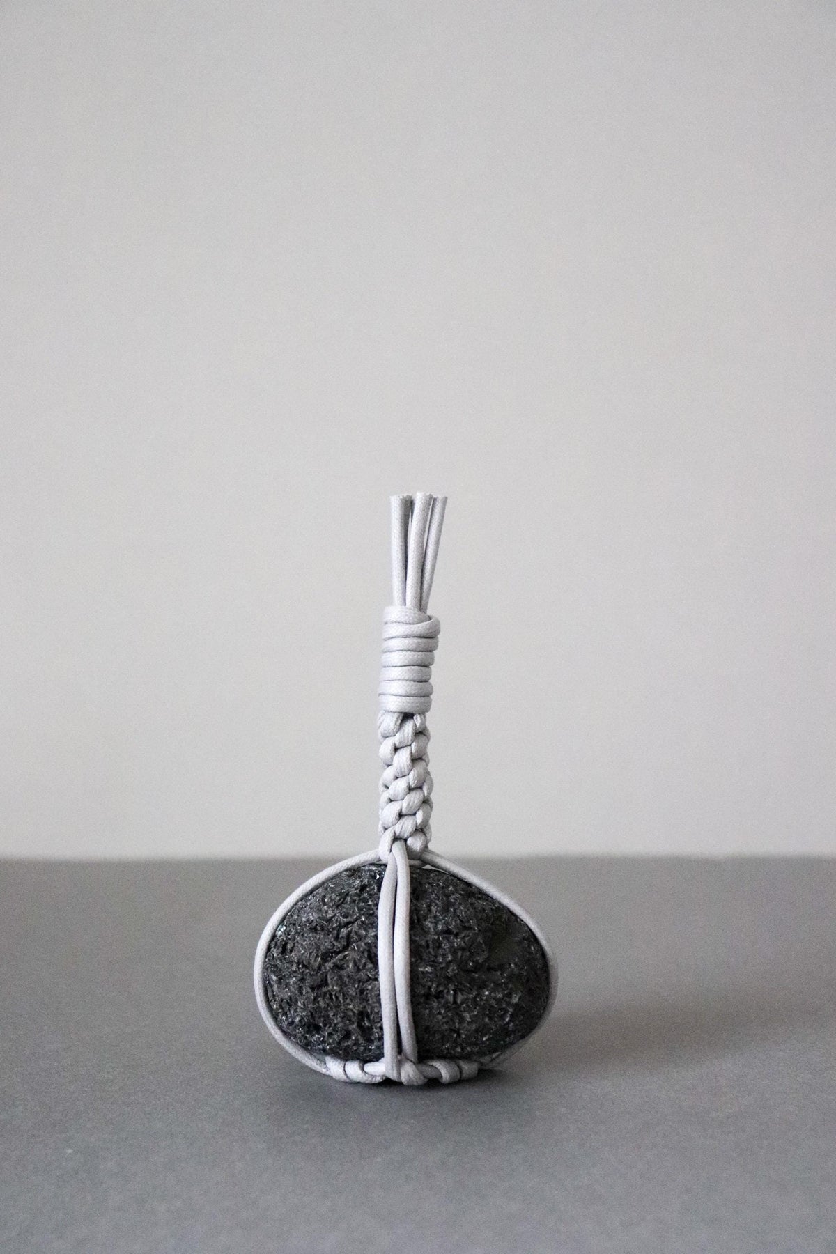 Japanese Sekimori-ishi Barrier Stone, Hokkaido Obsidian with White Waxed Cord, Wabi Sabi Garden Object