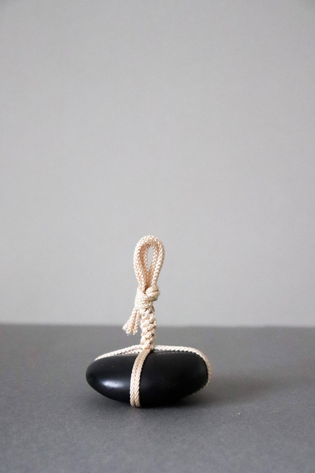 Japanese Sekimori-ishi Barrier Stone, Polished Nachiguro Stone with Edo-Style Braided Cord, Wabi Sabi Object